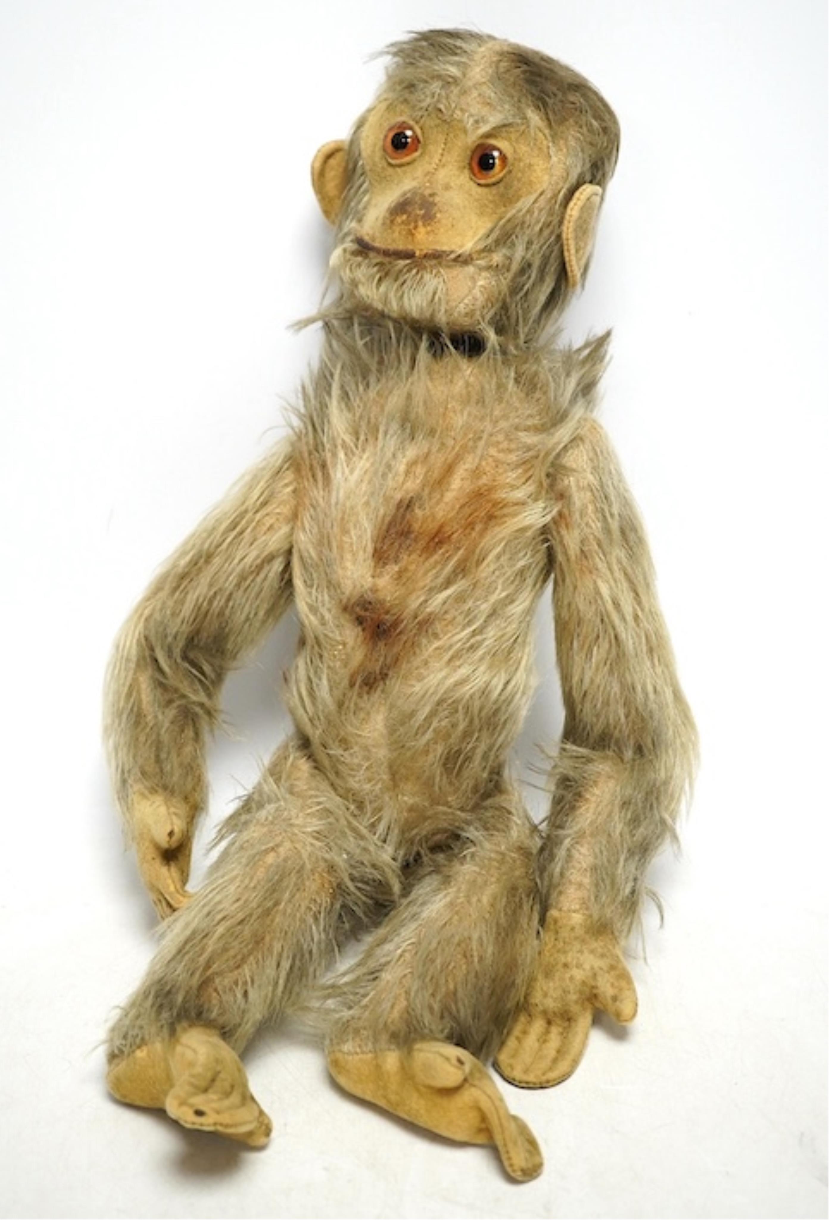 An early 20th century Schuco-type 'Yes No' monkey. Condition - fair, mechanism working